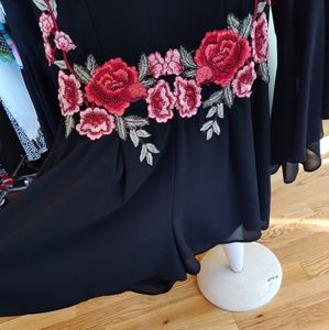 Sheer sleeve black romper